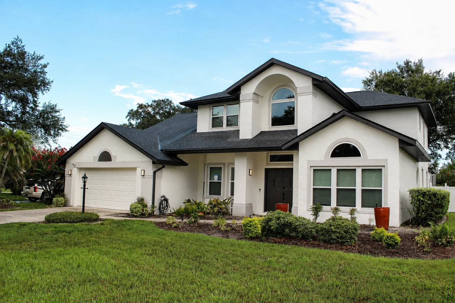 Two-story home with new seamless gutters in Oviedo, FL